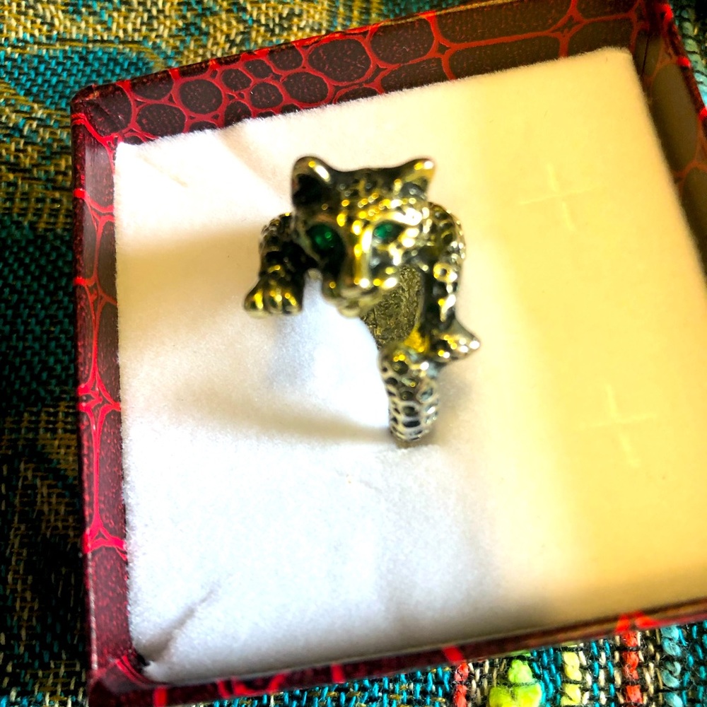 Cool cat statement ring with green stone eyes